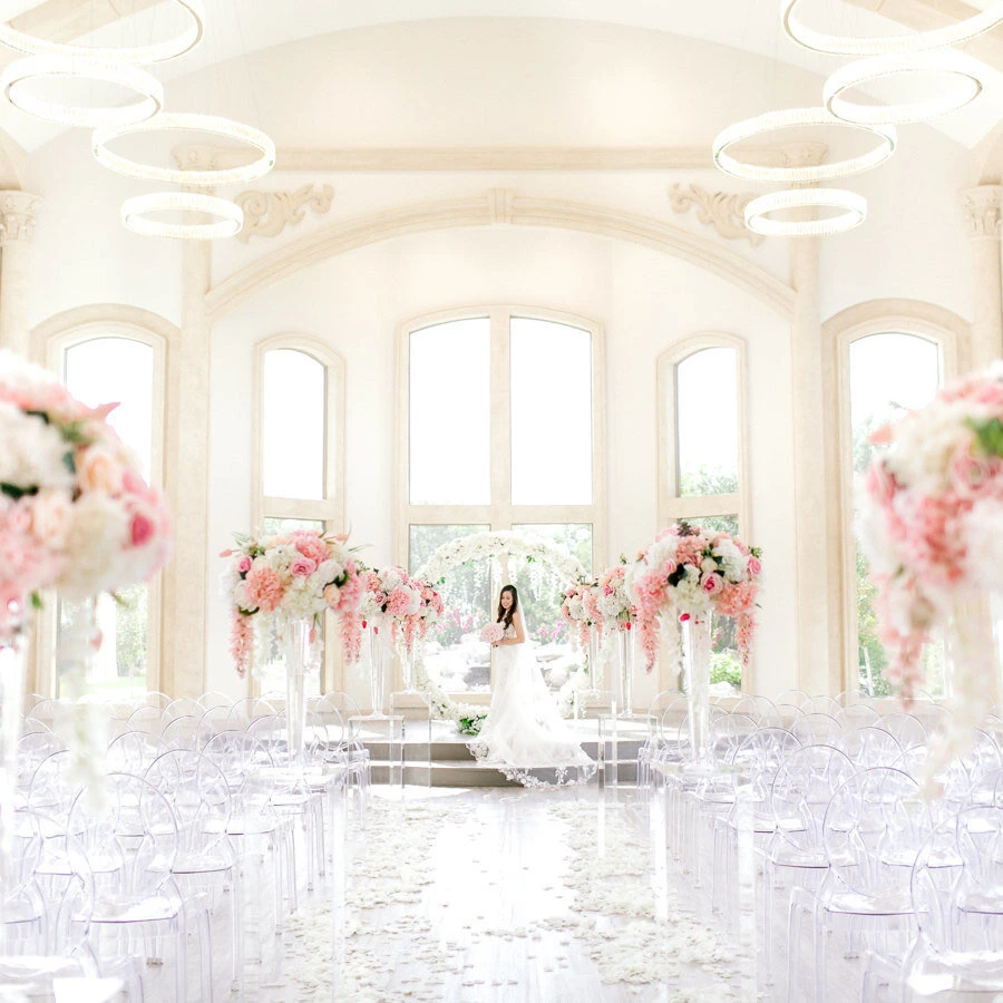 Bright reception space styled with coordinated silk wedding florals from Sherpa’s luxury wedding floral rentals in DFW, designed to feel elevated, cohesive, and stress-free.